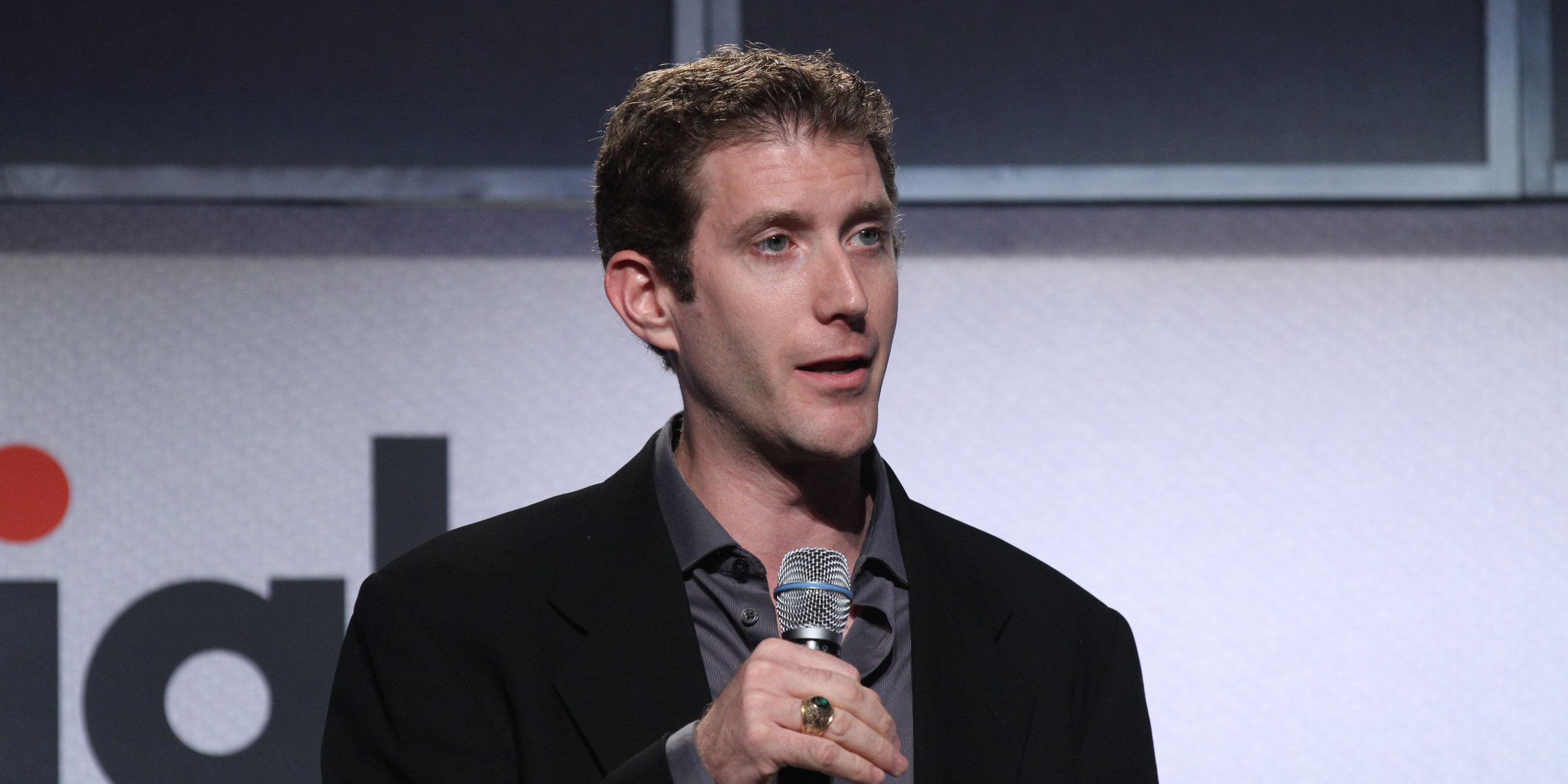 Speaking at a conference with microphone